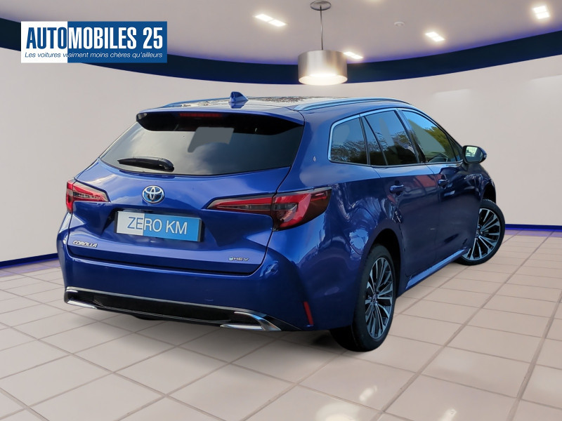Photo 2 de l'offre de TOYOTA COROLLA TOURING SPT 1.8 140CH DESIGN MY25 -24% à 29999€ chez Automobiles 25