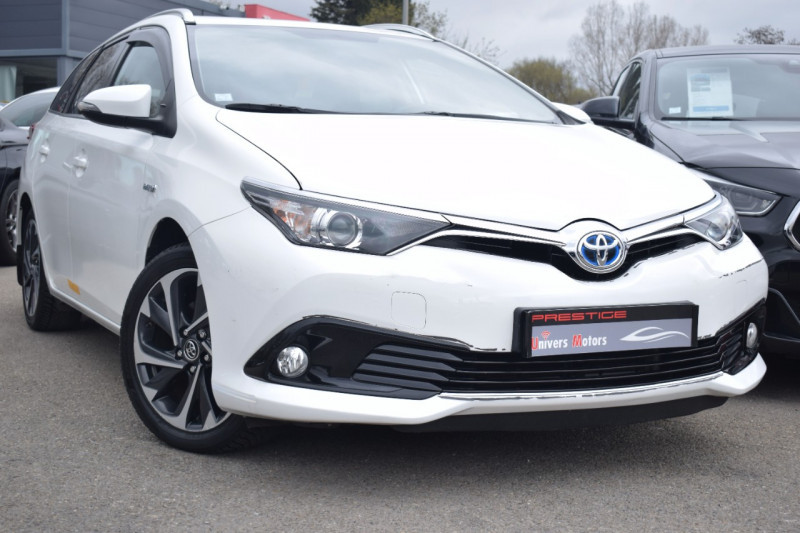 Toyota AURIS TOURING SPORTS HSD 136H LOUNGE Hybride BLANC Occasion à vendre