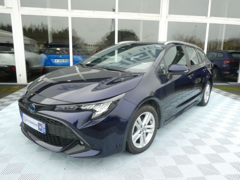 Toyota COROLLA (2) XII TOURING SPORTS 1.8 HYBRIDE 122H BVA Ph.2 DYNAMIC GPS Camera Hybride DARK BLUE MÉTAL Occasion à vendre