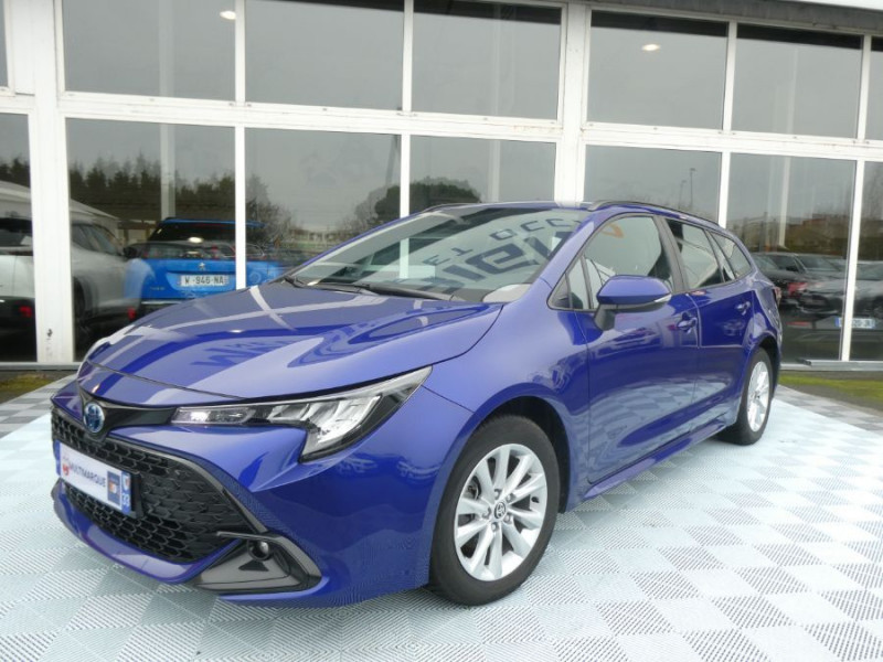 Toyota COROLLA (2) XII TOURING SPORTS 1.8 HYBRIDE 140H BVA Ph.2 DYNAMIC GPS Camera Hybride BLEU MÉTAL Occasion à vendre