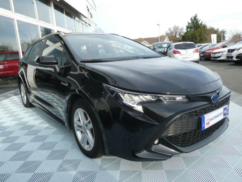 Photo 2 de l'offre de TOYOTA COROLLA XII TOURING SPORTS 1.8 HYBRIDE 122H BVA DYNAMIC Key Less Induction Radars Attel. à 21750€ chez Mérignac auto