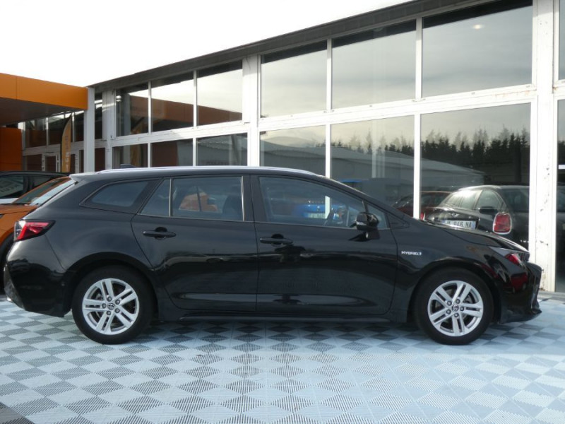 Photo 12 de l'offre de TOYOTA COROLLA XII TOURING SPORTS 1.8 HYBRIDE 122H BVA DYNAMIC Key Less Induction Radars Attel. à 21750€ chez Mérignac auto