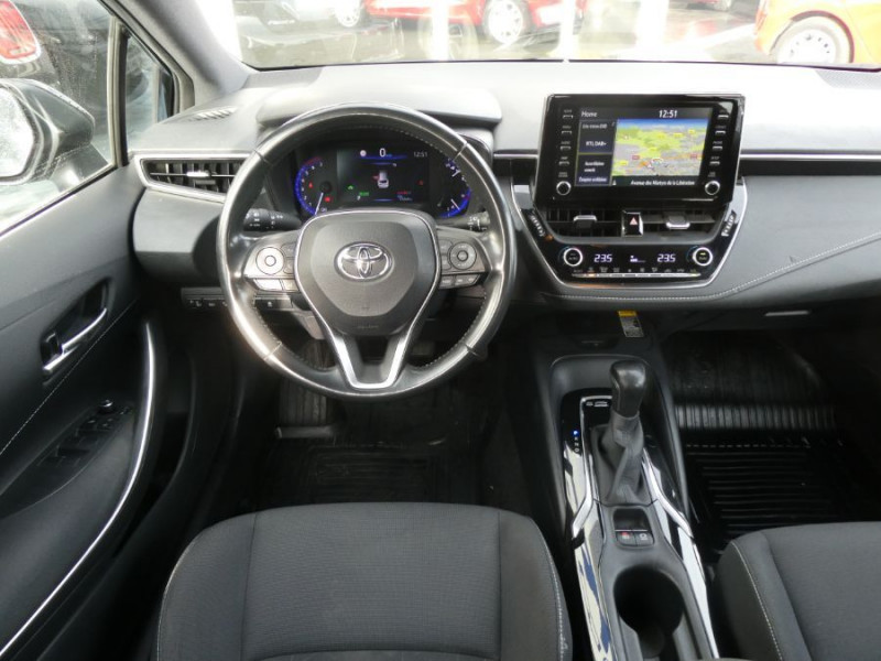 Photo 4 de l'offre de TOYOTA COROLLA XII TOURING SPORTS 1.8 HYBRIDE 122H BVA DYNAMIC Key Less Induction Radars Attel. à 21750€ chez Mérignac auto