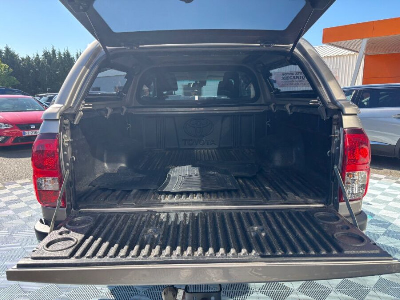 Photo 4 de l'offre de TOYOTA HILUX 2.4 150 D-4D BVM6 4WD X-TRA CABINE Hard Top Camera Attel. 29990HT à 35988€ chez Mérignac auto