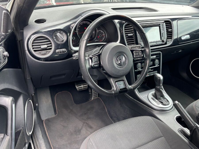 Photo 14 de l'offre de VOLKSWAGEN COCCINELLE CABRIOLET 1.2 TSI 105 DSG SOUND Fender GPS Xénon JA18 à 23450€ chez Mérignac auto