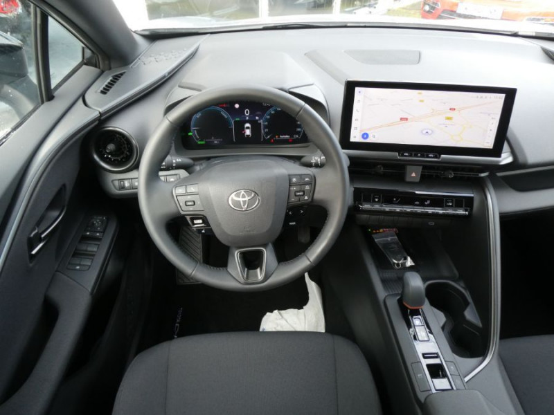 Photo 4 de l'offre de TOYOTA C-HR II 1.8 HYBRIDE 140 CVT 2WD DESIGN GPS 12.3 Camera JA18 Diam. Induction à 31450€ chez Mérignac auto