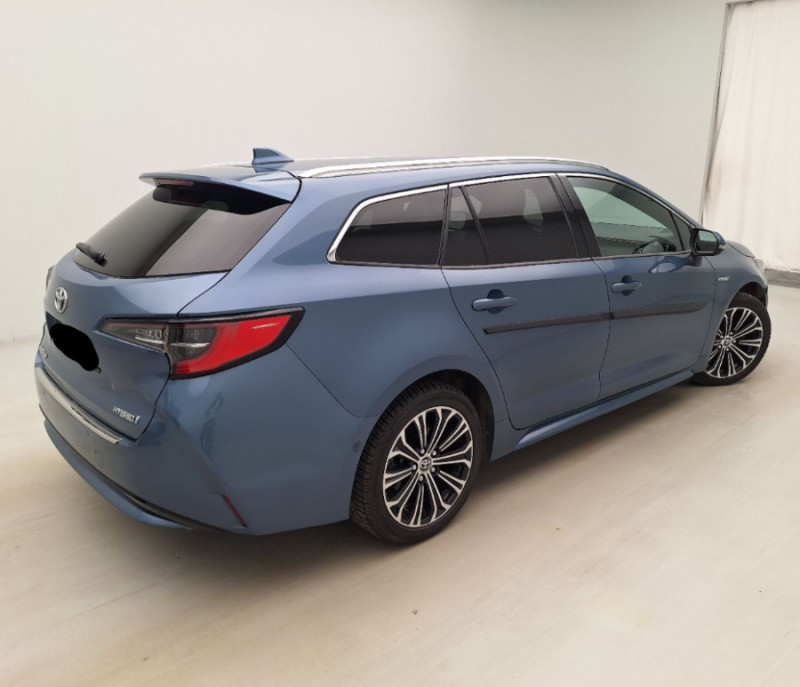 Photo 3 de l'offre de TOYOTA COROLLA XII TOURING SPORTS 1.8 HYBRIDE 122H BVA PREMIUM CUIR 4SC Hayon EL. JA17 à 24950€ chez Mérignac auto