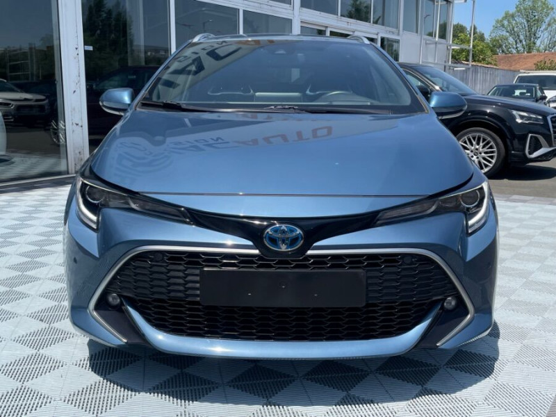 Photo 8 de l'offre de TOYOTA COROLLA XII TOURING SPORTS 1.8 HYBRIDE 122H BVA PREMIUM CUIR 4SC Hayon EL. JA17 à 24950€ chez Mérignac auto