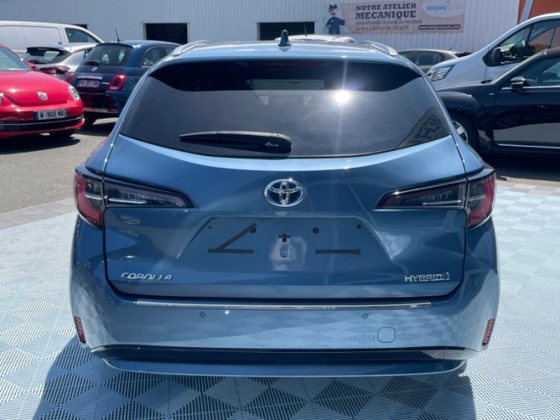 Photo 9 de l'offre de TOYOTA COROLLA XII TOURING SPORTS 1.8 HYBRIDE 122H BVA PREMIUM CUIR 4SC Hayon EL. JA17 à 24950€ chez Mérignac auto