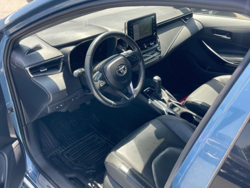 Photo 15 de l'offre de TOYOTA COROLLA XII TOURING SPORTS 1.8 HYBRIDE 122H BVA PREMIUM CUIR 4SC Hayon EL. JA17 à 24950€ chez Mérignac auto