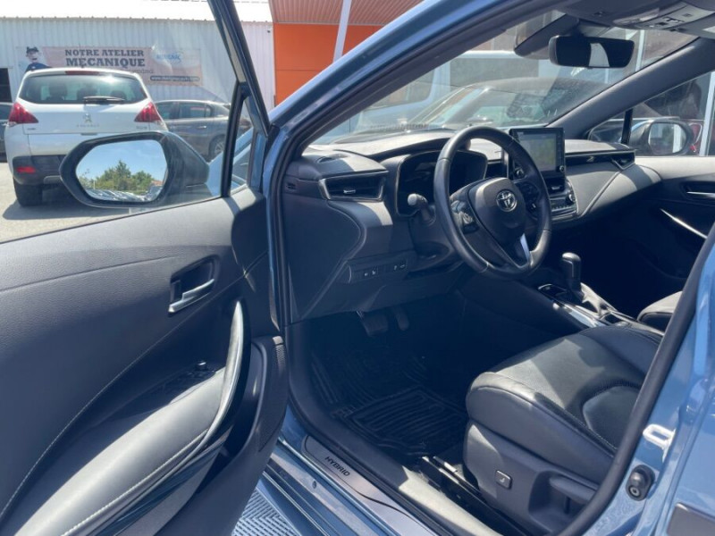 Photo 14 de l'offre de TOYOTA COROLLA XII TOURING SPORTS 1.8 HYBRIDE 122H BVA PREMIUM CUIR 4SC Hayon EL. JA17 à 24950€ chez Mérignac auto