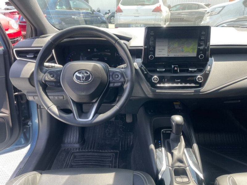 Photo 4 de l'offre de TOYOTA COROLLA XII TOURING SPORTS 1.8 HYBRIDE 122H BVA PREMIUM CUIR 4SC Hayon EL. JA17 à 24950€ chez Mérignac auto