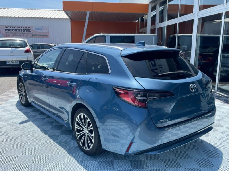 Photo 10 de l'offre de TOYOTA COROLLA XII TOURING SPORTS 1.8 HYBRIDE 122H BVA PREMIUM CUIR 4SC Hayon EL. JA17 à 24950€ chez Mérignac auto