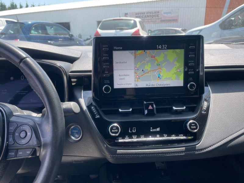 Photo 6 de l'offre de TOYOTA COROLLA XII TOURING SPORTS 1.8 HYBRIDE 122H BVA PREMIUM CUIR 4SC Hayon EL. JA17 à 24950€ chez Mérignac auto