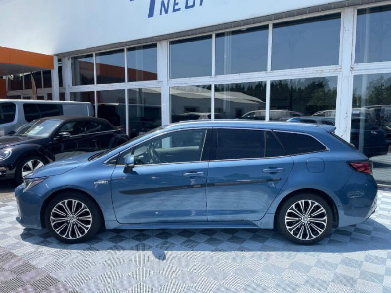 Photo 12 de l'offre de TOYOTA COROLLA XII TOURING SPORTS 1.8 HYBRIDE 122H BVA PREMIUM CUIR 4SC Hayon EL. JA17 à 24950€ chez Mérignac auto