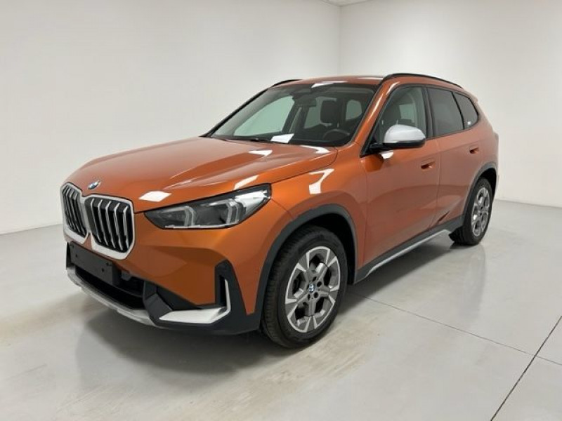 Photo Bmw X1 (U11) SDRIVE18I 136CH XLINE + VOLANT M + ED.BALANCE Essence UTAH ORANGE en vente chez e-Vago Bmw X1 (U11) SDRIVE18I 136CH XLINE + VOLANT M + ED.BALANCE Essence UTAH ORANGE Occasion à vendre