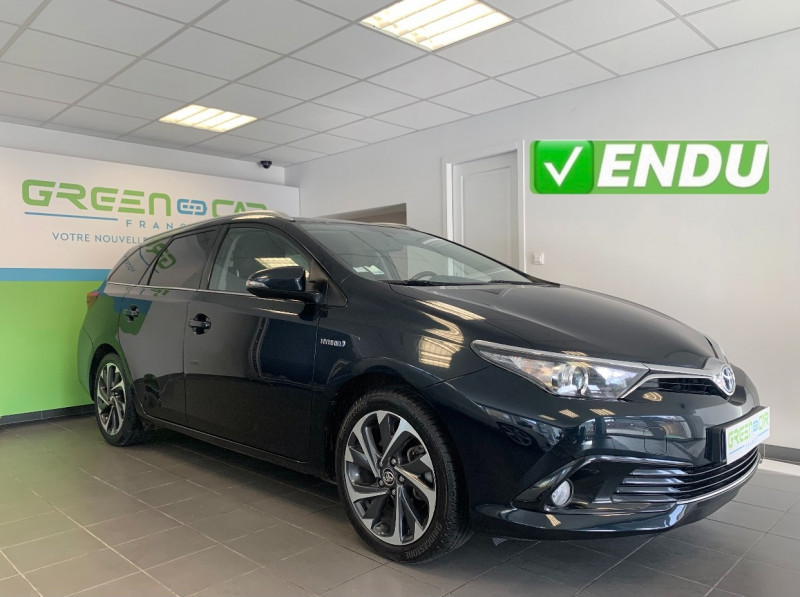 Photo 1 de l'offre de TOYOTA AURIS TOURING SPORTS HSD 136H DESIGN BUSINESS à 16980€ chez Greencar France