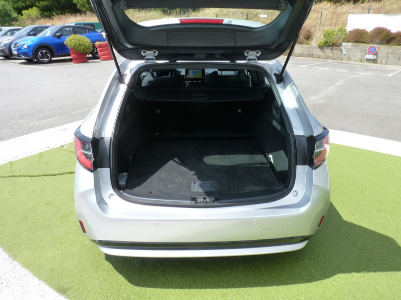 Photo 13 de l'offre de TOYOTA COROLLA TOURING SPT 122H DYNAMIC BUSINESS à 17990€ chez Vent d'ouest automobiles
