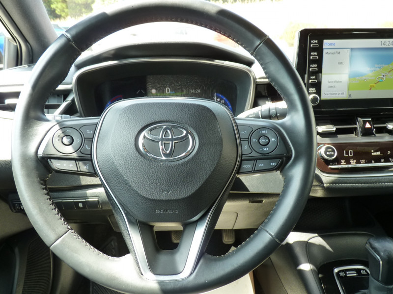 Photo 8 de l'offre de TOYOTA COROLLA TOURING SPT 122H DYNAMIC BUSINESS à 17990€ chez Vent d'ouest automobiles