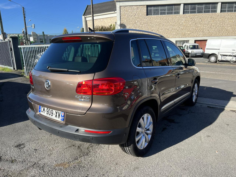 Photo 5 de l'offre de VOLKSWAGEN TIGUAN 2.0 TDI 110 CARAT GPS CUIR DISTRI OK à 13490€ chez Triplo auto