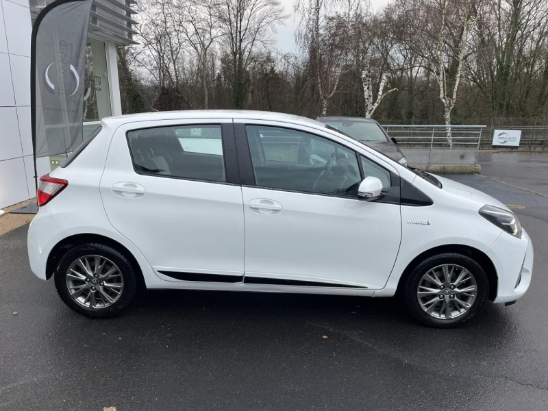 Photo 8 de l'offre de TOYOTA YARIS HYBRIDE 100H BV E-CVT III DYNAMIC CLIM - 61882KM à 16490€ chez Triplo auto