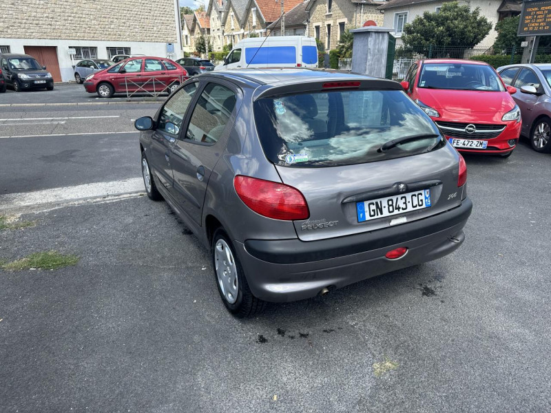 Photo 22 de l'offre de PEUGEOT 206  1.4I - 75 XT PACK   CLIM à 6490€ chez Triplo auto