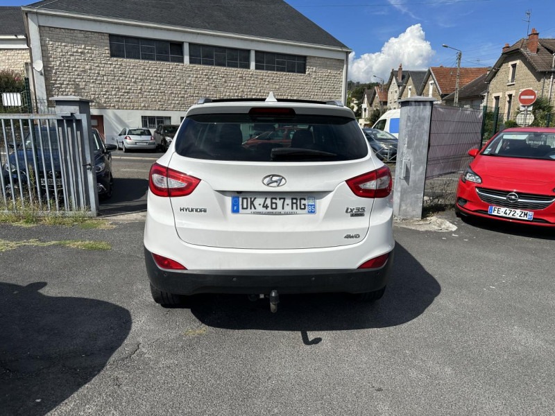 Photo 4 de l'offre de HYUNDAI IX35 2.0 CRDI - 136 4X4 PACK PREMIUM LIMITED TOIT OUVRANT   ATTELAGE à 13990€ chez Triplo auto
