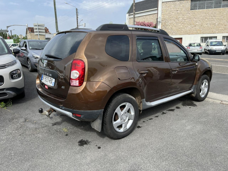 Photo 22 de l'offre de DACIA DUSTER 1.5 DCI FAP - 110 4X4 PRESTIGE CLIM   ATTELAGE à 12990€ chez Triplo auto