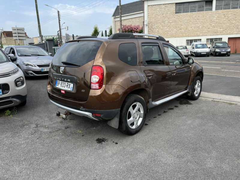 Photo 5 de l'offre de DACIA DUSTER 1.5 DCI FAP - 110 4X4 PRESTIGE CLIM   ATTELAGE à 12990€ chez Triplo auto