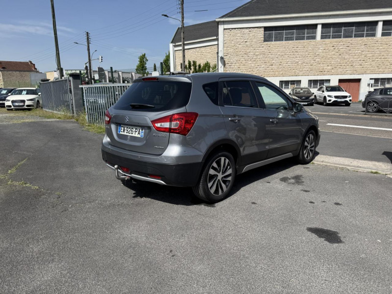 Photo 5 de l'offre de SUZUKI SX4 S-CROSS S-CROSS 1.4 BOOSTERJET ALLGRIP - BVA S-CROSS STYLE GPS   CAMERA AR   TOIT OUVRANT à 12990€ chez Triplo auto
