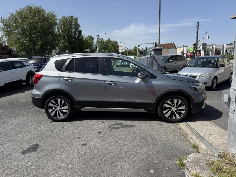 Photo 6 de l'offre de SUZUKI SX4 S-CROSS S-CROSS 1.4 BOOSTERJET ALLGRIP - BVA S-CROSS STYLE GPS   CAMERA AR   TOIT OUVRANT à 12990€ chez Triplo auto