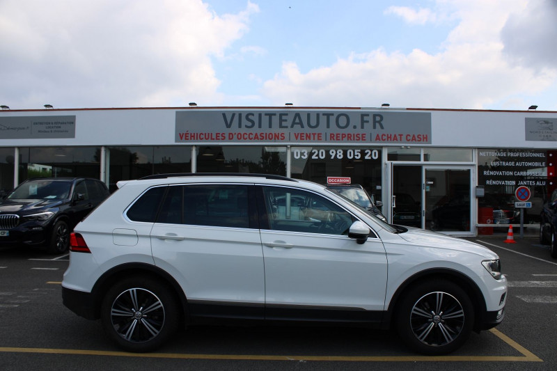 Photo 2 de l'offre de VOLKSWAGEN TIGUAN 1.4 TSI 150CH ACT BLUEMOTION TECHNOLOGY CONFORTLINE HAYON ELECTRIQU DISCOVER PRO à 17990€ chez Visiteauto.fr