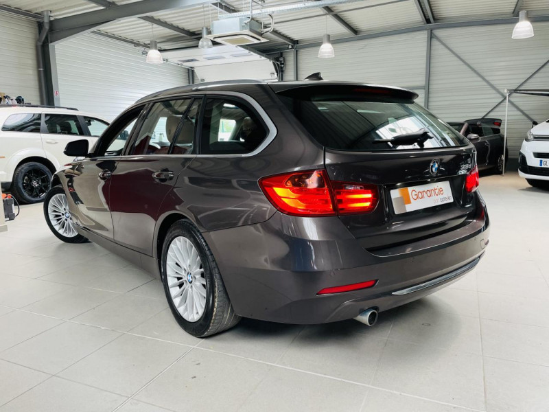 Photo 17 de l'offre de BMW serie 3 touring 318d 143 ch F31 Luxury BVA8 à 12990€ chez Occasions Champenoises