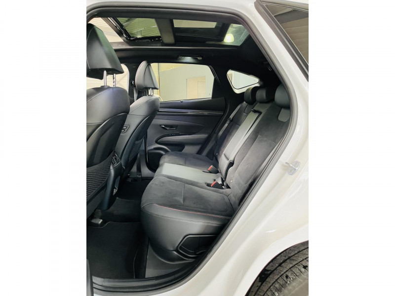 Photo 18 de l'offre de HYUNDAI TUCSON 1.6 T-GDI 265 HTRAC Plug-in BVA6 N Line Executive - LOA 460 e/mois à 31990€ chez Occasions Champenoises