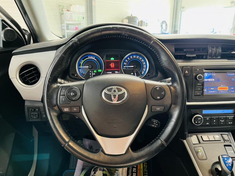 Photo 4 de l'offre de TOYOTA AURIS Hybride 136h CVT Style à 13490€ chez Occasions Champenoises