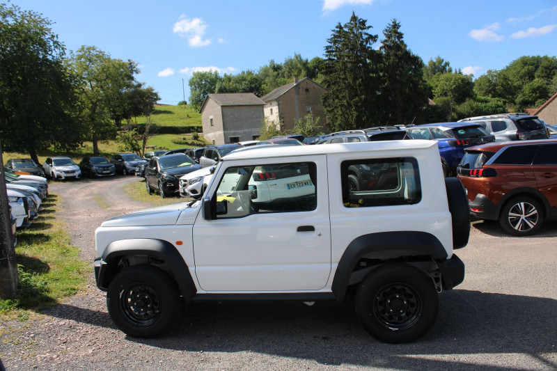 Photo 5 de l'offre de SUZUKI JIMNY III 1L5 VVT 102CV PRIVIÈGE 4X4 ATTELAGE RÉGULATEUR BLUETOOTH SIÈGES CHAUF. CLIM USB à 25900€ chez Bougel transactions