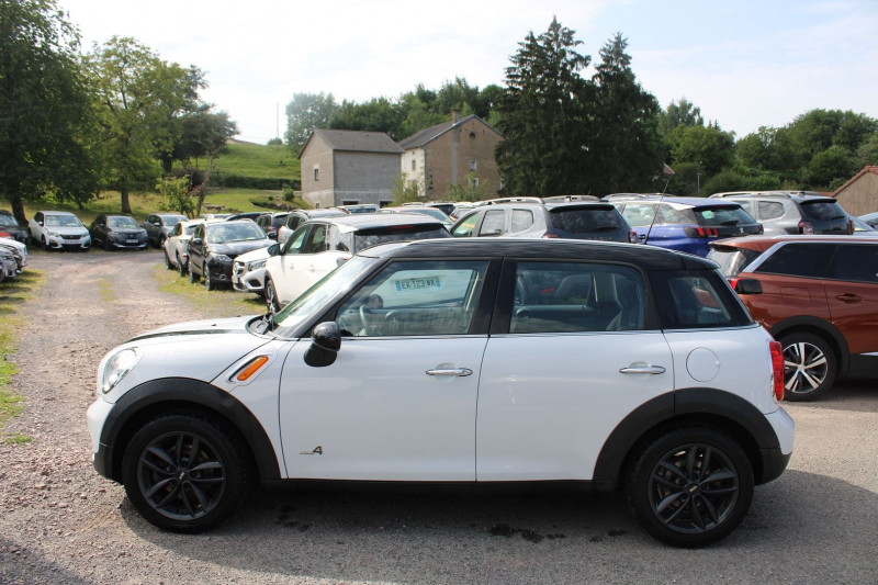 Photo 5 de l'offre de MINI COUNTRYMAN COOPER.D 112 4WD 4X4 BOITE AUTO 6V DIESEL BICOLOR CLIMAT LASER ABS ESP JA BLACKS à 14800€ chez Bougel transactions