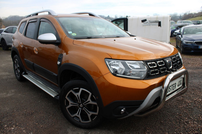 Dacia DUSTER III DCI 115 CV PRESTIGE  4X4  GPS 3D CAMÉRA USB JA 17 ATTELAGE BLUETOOTH RÉGULATEUR Diesel ORANGE ATACAMA Occasion à vendre