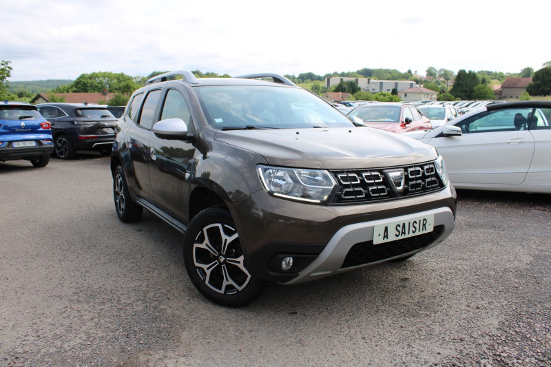 Dacia DUSTER III 1L3 TCE 130 CV PRESTIGE RAINBOW LUXE CAMÃRA GPS USB JANTES 17 BOITE 6V ATTELAGE Essence BRUN NOCCIOLA Occasion à vendre