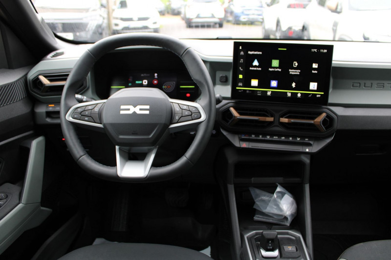 Photo 10 de l'offre de DACIA DUSTER VI EXTREME 140 CV HYBRIDE GPS 3D JA 18 CAMÃRA 360Â° USB I-COKPIT FULL LED BOITE AUTO à 27990€ chez Bougel transactions